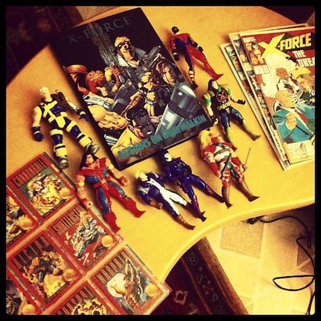 Photograph of X-Force comic books and action figures