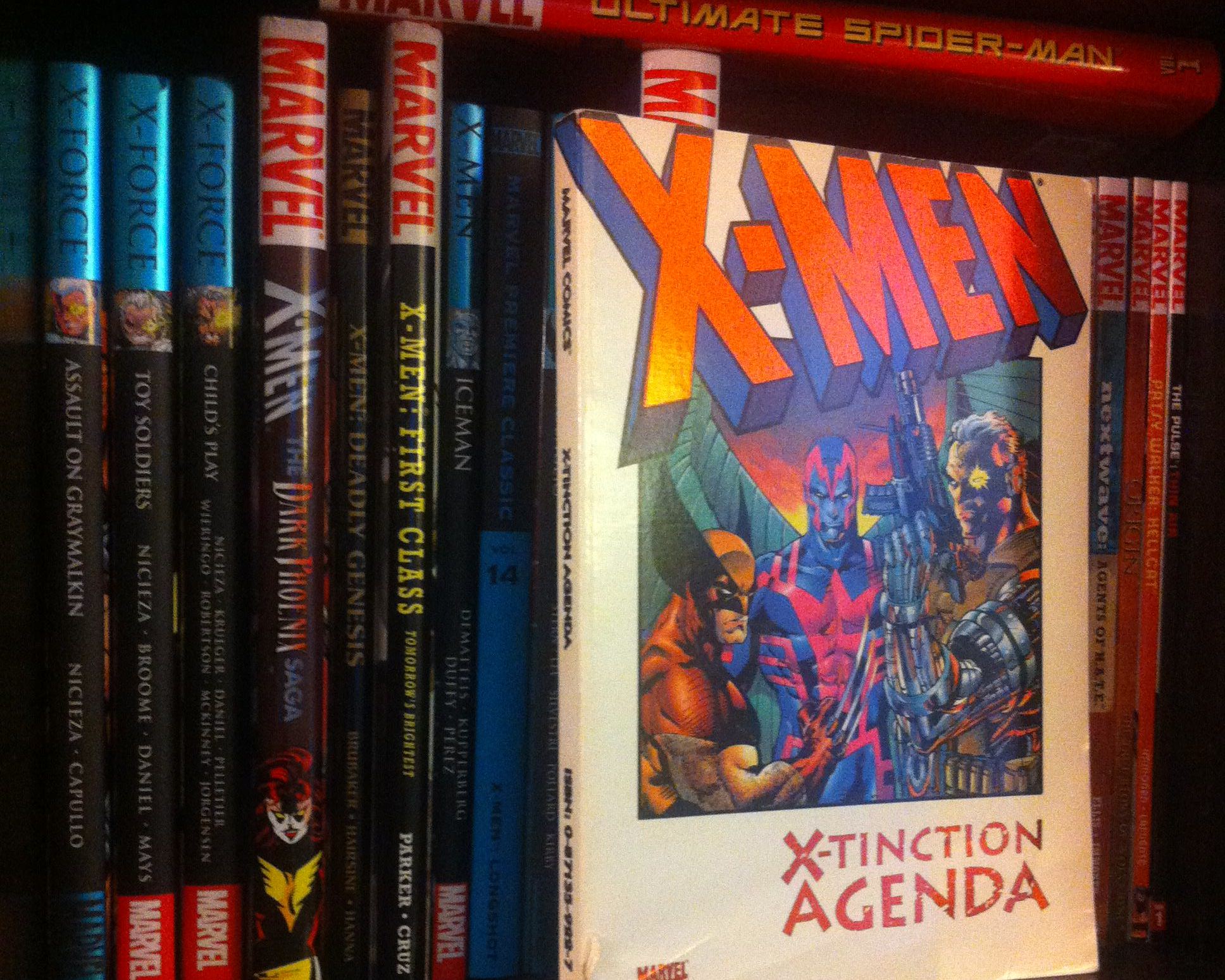 X-Tinction Agenda on a bookshelf
