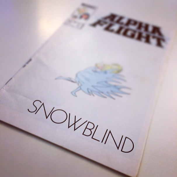 "Snowblind" cover on a table